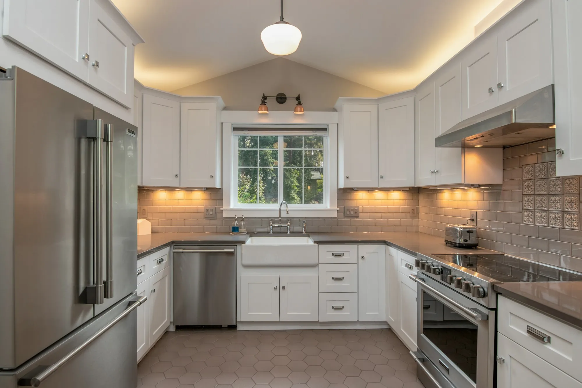 Remodeled kitchen with new cabinets and counters