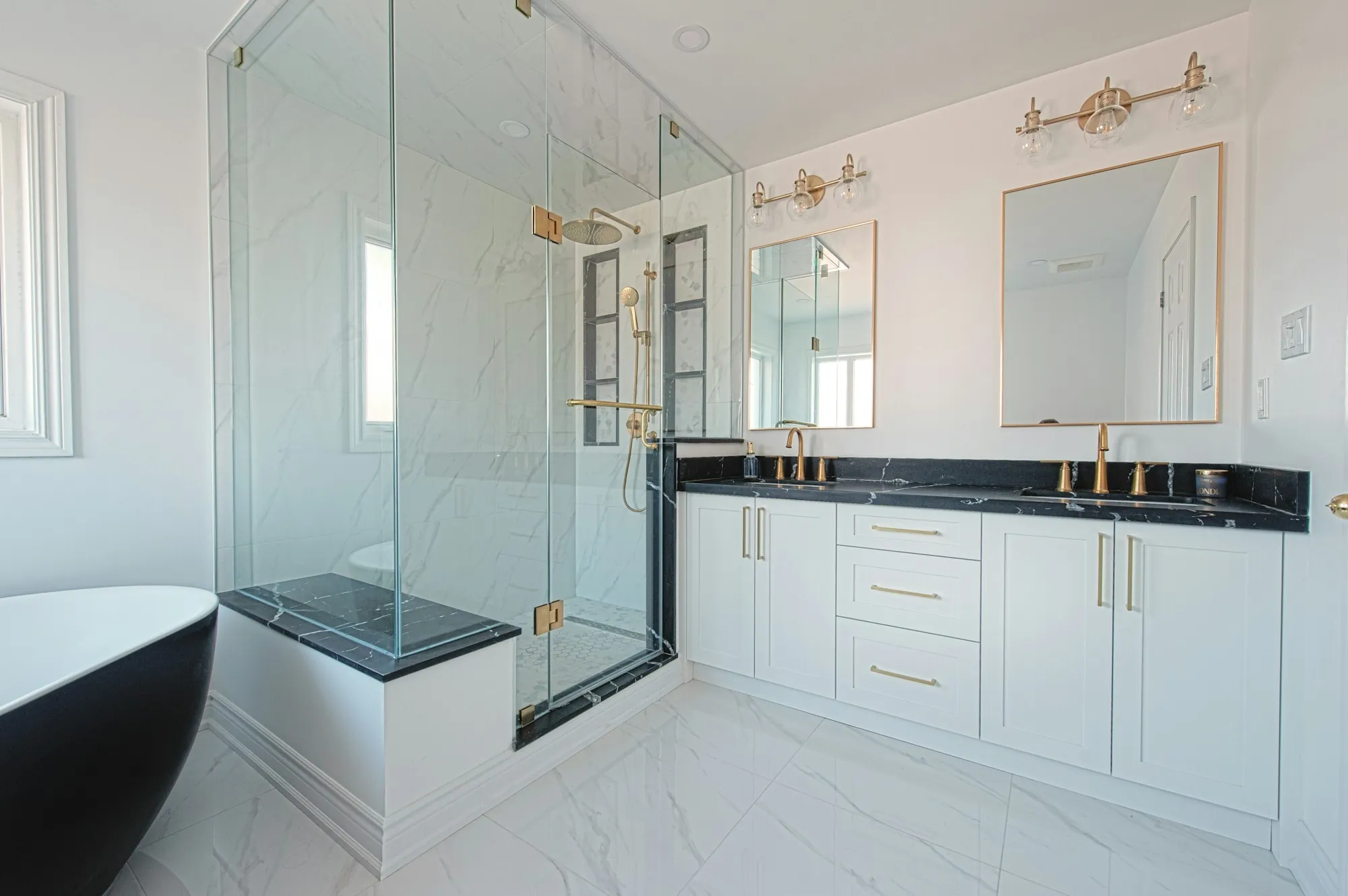 Renovated bathroom with tile and a vanity